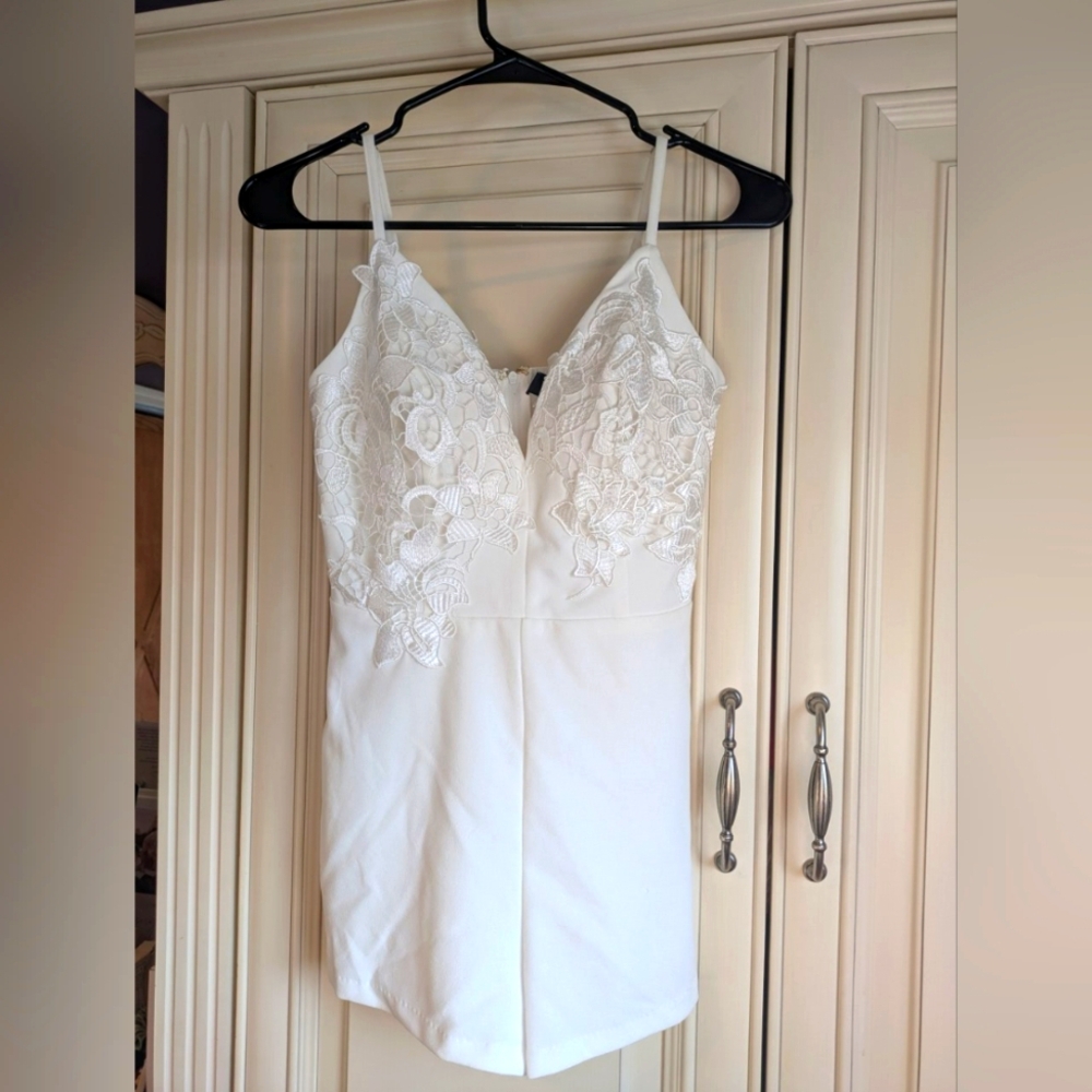 White, spaghetti strap romper. Windsor size Small.